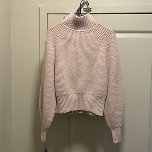 Pink turtleneck